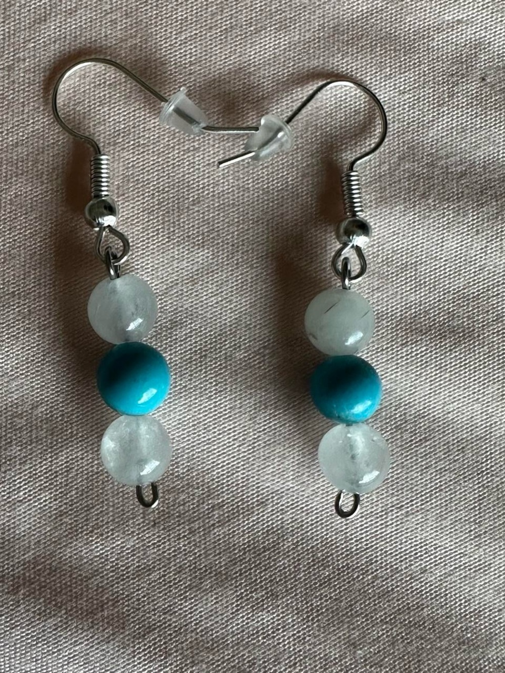 Vintage clear quartz crystal bead and blue bead dangly earrings.
